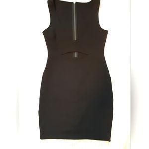 Little Black Sleeveless Dress with stomach Cutout and gold back zipper.